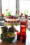 Strawberry cake and lemonade on table