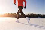 Mature woman jogging in winter