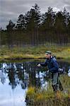 A man fly-fishing, Sweden.