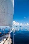 Sailing in the very flat waters of the Mamanuca Islands, Fiji, South Pacific