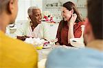 Smiling women enjoying party at table