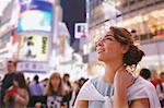 Caucasian woman enjoying sightseeing in Tokyo, Japan