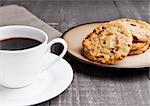 coffee cup with cookie for breakfast morning in cafe