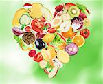 Vegetable and fruit forming a heart. Healthy food for wellness concept