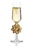 Glass of champagne with christmas decoration gift on white isolated