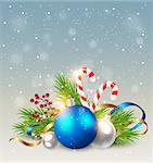Christmas background with blue decoration, candy cane and green fir branch. Design for Christmas card.