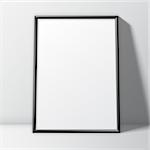 Blank white paper poster in thin black frame standing on floor. Poster mock-up template