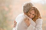 Portrait smiling affectionate couple hugging