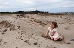 Little girl playing on beach, Vancouver, British Columbia, Canada