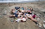 Group of young women sunbathing on beach, Block Island, Rhode Island, USA