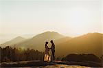 Pregnant couple in mountains, Sequoia national park, California, USA