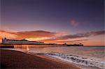 Brighton Pier and beach at sunrise, Brighton, East Sussex, Sussex, England, United Kingdom, Europe