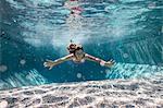 Girl swimming in pool