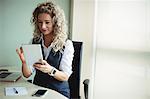 Businesswoman using digital tablet