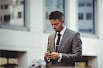 Businessman using mobile phone