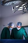 Surgeons performing operation in operation theater