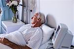 Male senior patient relaxing in the ward