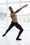 Portrait of ballerino practising ballet dance