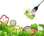 Background of mixed salad eaten with a fork. Healthy food for wellness concept