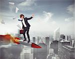 Businessman flying on a rocket over the city. Increase the climb to success concept