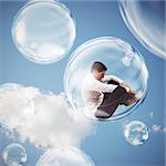 Sad businessman flies in a bubble. isolate themselves inside a bubble detachment from the outside world concept