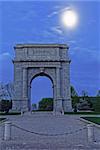 Springtime predawn moonlight at Valley Forge National Historical Park in Pennsylvania, USA.The National Memorial Arch is a monument dedicated to George Washington and the United States Continental Army.