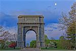 Springtime dawn with the moon shining at Valley Forge National Historical Park in Pennsylvania, USA.The National Memorial Arch is a monument dedicated to George Washington and the United States Continental Army.