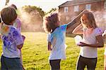 Children Celebrating Holi Festival With Paint Party