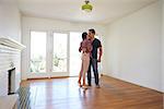 Romantic Couple In New Home On Moving Day