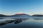 Morning light illuminating Mount Fuji at Lake Yamanaka, Yamanashi Prefecture, Japan