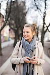 Teenage girl using cell phone