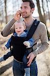 Man with baby boy in carrier