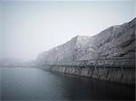 Wooden path on rocky cliff