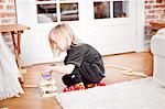 Boy playing with toy blocks