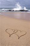 High angle view of hearts shape drawn in sand on beach, Western Province, Sri Lanka