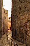 Steep and narrow winding street in gorgeous medieval hilltop walled village, Pals, Baix Emporda, Girona, Catalonia, Spain, Europe