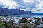 View over rooftops to Lake Wanaka at dusk, Wanaka, Queenstown-Lakes district, Otago, South Island, New Zealand, Pacific