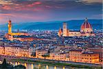 Cityscape image of Florence, Italy during dusk.