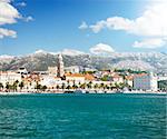 View of Riva and Old Town Split in Dalmatia region, Croatia. Ancient Diocletian's Palace on a Sunny Summer Day. Popular Tourist Destination at Adriatic Sea. Mediterranean Europe Travel Concept.
