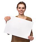 Woman showing blank banner. Beautiful girl presenting paper sheet with copy space. Isolated on white