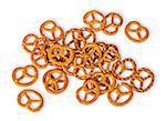 Heap crunchy pretzels with salt isolated on white background