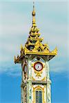 clock tower of the Maha Myat Muni Pagoda temple Mandalay city Myanmar