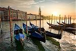 Gondolas and architecture in Venice at sunset, Italy