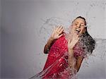 Woman splashed with water