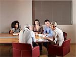 Group of people at boardroom table