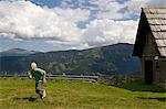 boy running in mountains