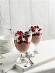 Bowls of chocolate mousse with fruit