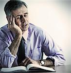 Businessman sleeping at desk