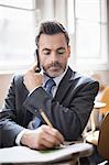 Businessman talking on cell phone