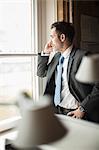 Businessman talking on cell phone